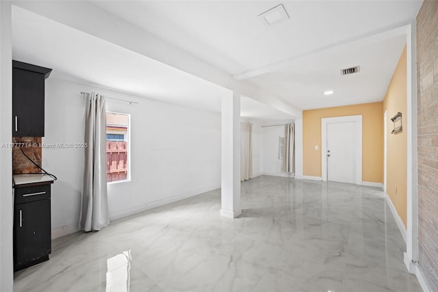 721 NW 6th St, Hallandale Beach, FL 33009 - spare room with visible vents, baseboards, and marble finish floor