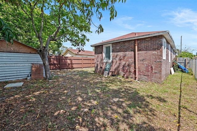 721 NW 6th St, Hallandale Beach, FL 33009 - view of yard with a fenced backyard
