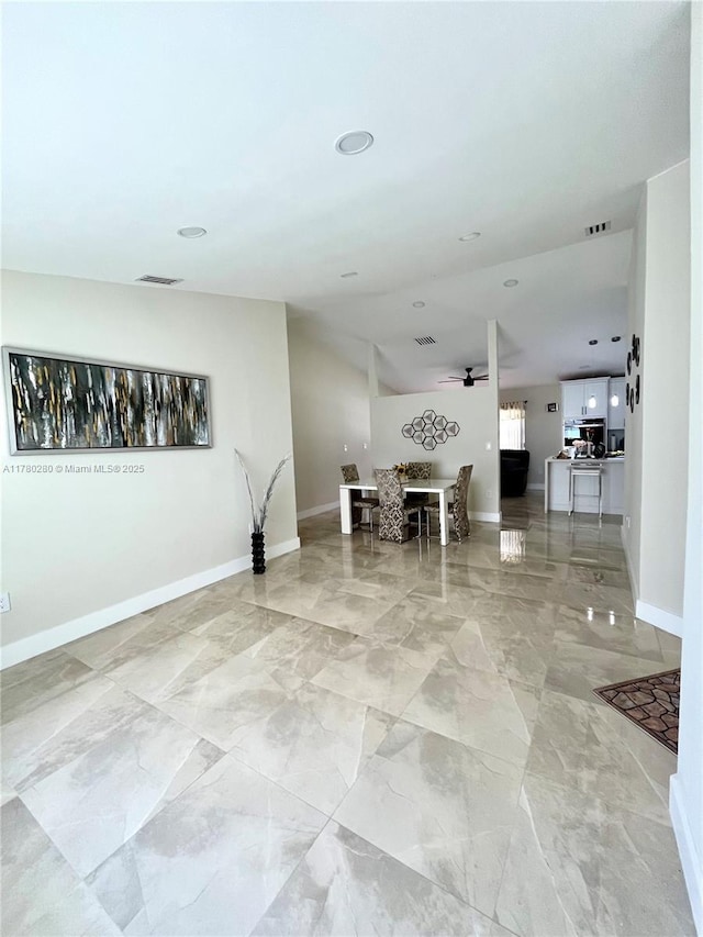 interior space with visible vents, marble finish floor, and baseboards