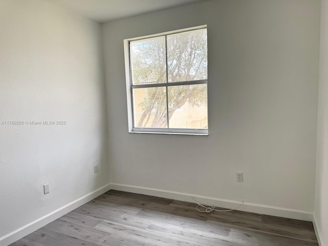 2524 SE 16th Rd Unit 201, Homestead, FL 33035 - unfurnished room with baseboards and wood finished floors