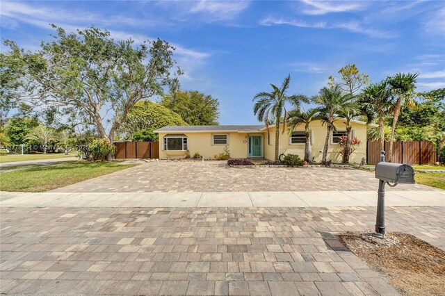 16395 SW 279th St, Homestead, FL 33031 - ranch-style house with decorative driveway and stucco siding