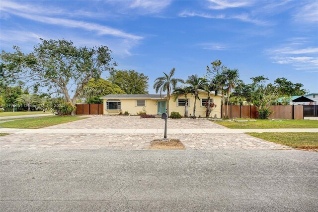 16395 SW 279th St, Homestead, FL 33031 - ranch-style house featuring stucco siding and driveway