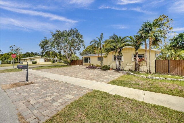 16395 SW 279th St, Homestead, FL 33031 - ranch-style house with decorative driveway and stucco siding