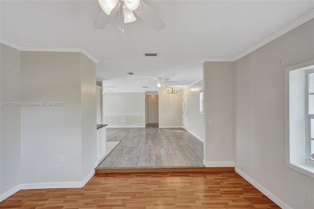16395 SW 279th St, Homestead, FL 33031 - unfurnished room with a ceiling fan, light wood-type flooring, crown molding, and baseboards