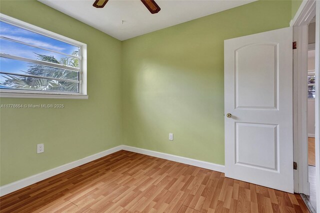 16395 SW 279th St, Homestead, FL 33031 - empty room featuring light wood-style floors, baseboards, and a ceiling fan