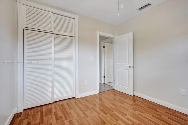 16395 SW 279th St, Homestead, FL 33031 - unfurnished bedroom featuring light wood-style floors, baseboards, and a closet