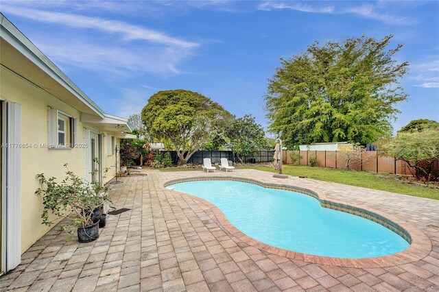 16395 SW 279th St, Homestead, FL 33031 - view of swimming pool featuring a patio