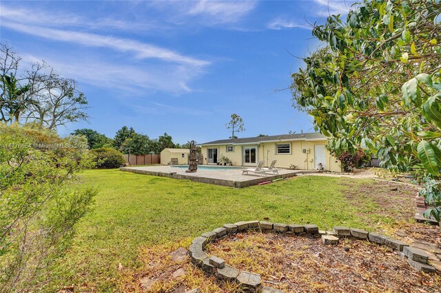 16395 SW 279th St, Homestead, FL 33031 - rear view of house with a patio area and stucco siding