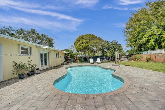 16395 SW 279th St, Homestead, FL 33031 - view of pool with a patio area and french doors