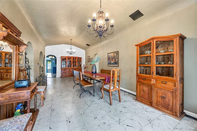 dining space featuring arched walkways, marble finish floor, vaulted ceiling, visible vents, and a notable chandelier