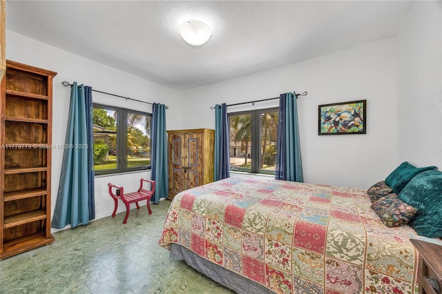 bedroom with tile patterned floors