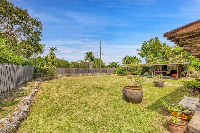 view of yard featuring a fenced backyard