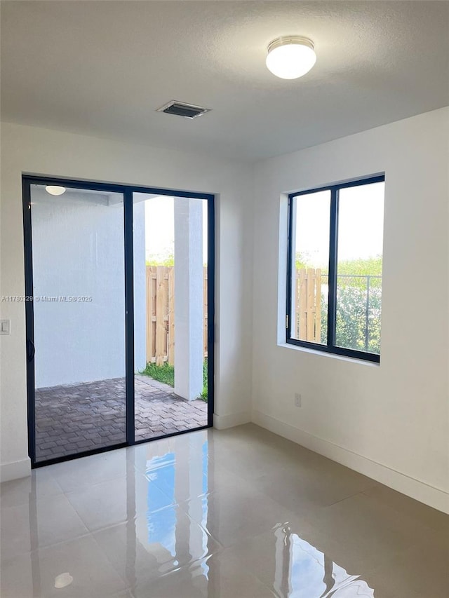 15771 SW 136th Ter, Miami, FL 33196 - unfurnished room featuring baseboards and visible vents