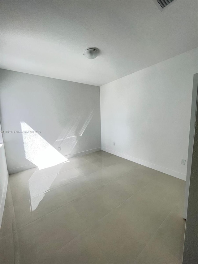 15771 SW 136th Ter, Miami, FL 33196 - empty room with visible vents and baseboards