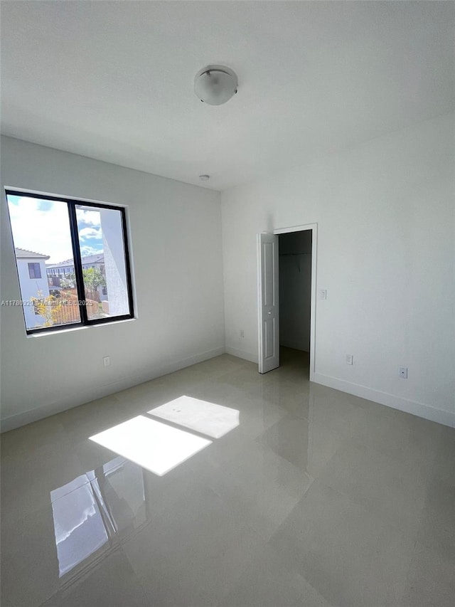 15771 SW 136th Ter, Miami, FL 33196 - unfurnished room with baseboards