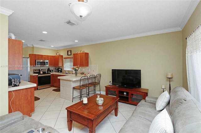 living area featuring recessed lighting, light tile patterned floors, visible vents, and crown molding