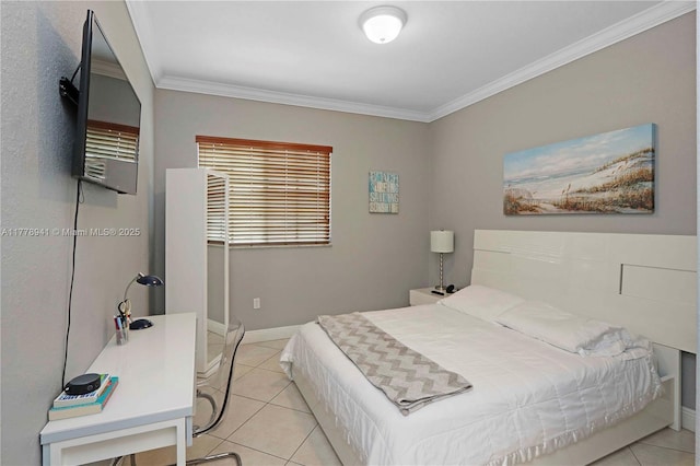 bedroom featuring ornamental molding, baseboards, and light tile patterned floors