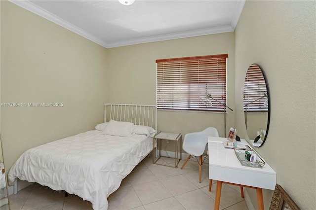 bedroom featuring crown molding, baseboards, and tile patterned floors