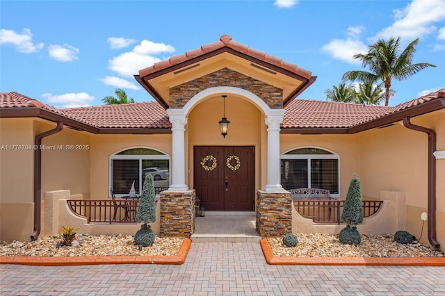 3663 SW 150th Ct, Miami, FL 33185 - entrance to property with a tiled roof, stucco siding, and a porch