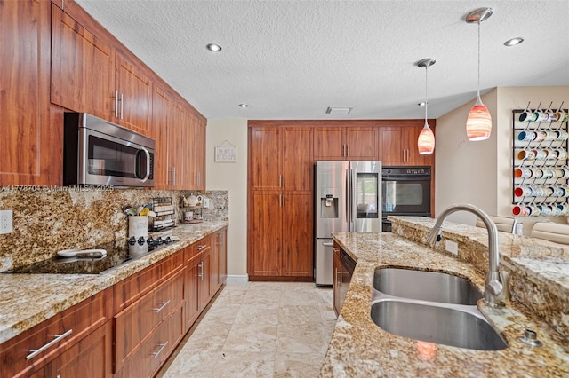 3663 SW 150th Ct, Miami, FL 33185 - kitchen featuring appliances with stainless steel finishes, a textured ceiling, pendant lighting, light stone counters, and backsplash