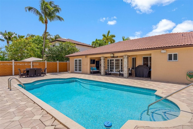 3663 SW 150th Ct, Miami, FL 33185 - view of swimming pool with french doors and a patio area