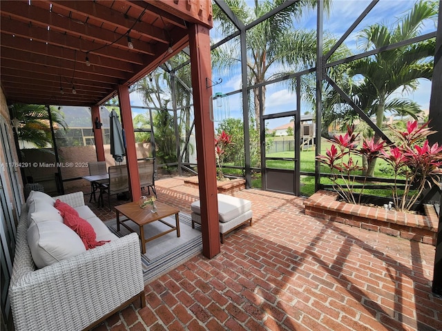 sunroom / solarium featuring an outdoor hangout area