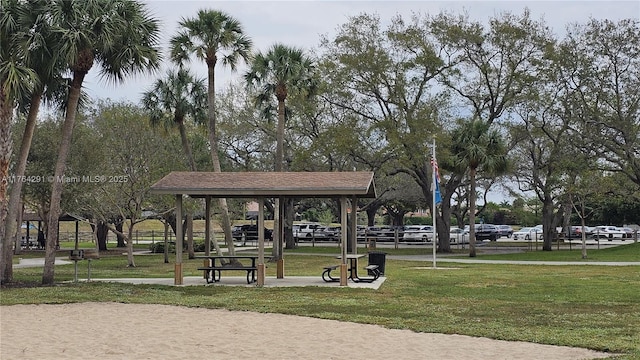 view of property's community with a gazebo and a lawn