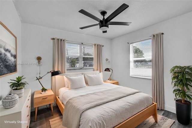 420 S 61st Ter, Hollywood, FL 33023 - bedroom with baseboards, a ceiling fan, and dark wood finished floors