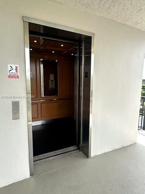 9311 Orange Grove Dr Unit 406, Davie, FL 33324 - doorway to property featuring elevator