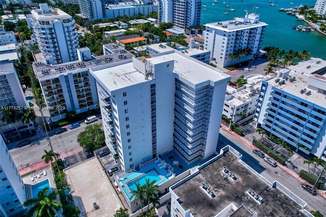 bird's eye view featuring a city view and a water view