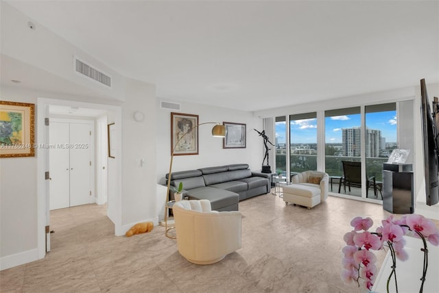 7000 Island Blvd Unit 1208, Aventura, FL 33160 - living room with baseboards