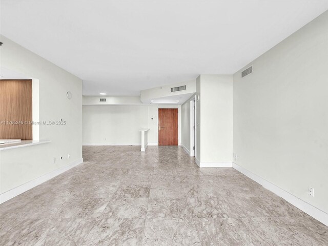 7000 Island Blvd Unit 1208, Aventura, FL 33160 - empty room with baseboards