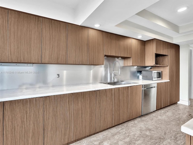 7000 Island Blvd Unit 1208, Aventura, FL 33160 - kitchen featuring appliances with stainless steel finishes, a raised ceiling, light countertops, and recessed lighting