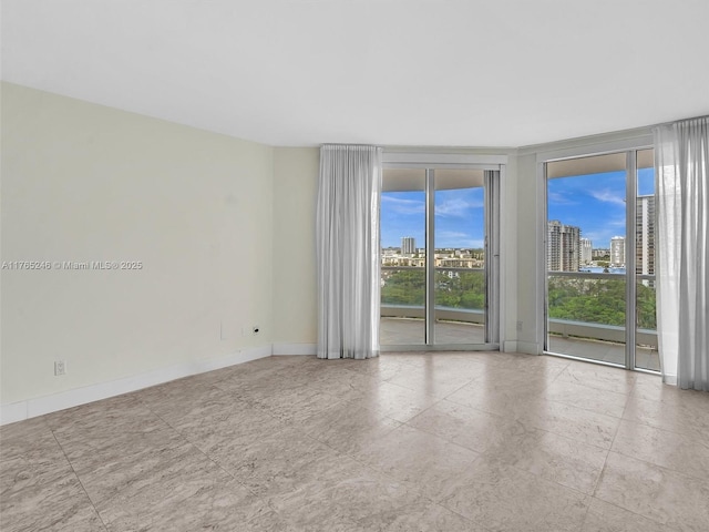 7000 Island Blvd Unit 1208, Aventura, FL 33160 - unfurnished room with floor to ceiling windows and a view of city