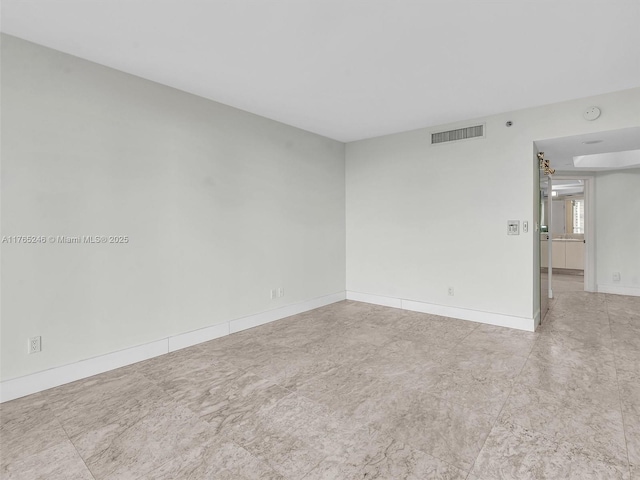 7000 Island Blvd Unit 1208, Aventura, FL 33160 - empty room featuring baseboards and a smoke detector