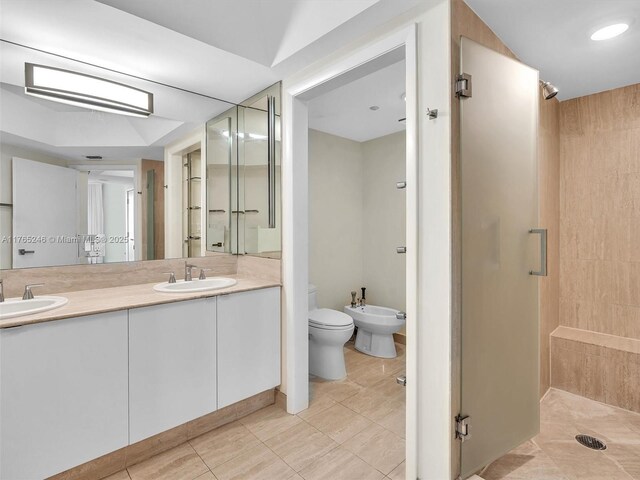 7000 Island Blvd Unit 1208, Aventura, FL 33160 - full bathroom featuring a stall shower, a bidet, double vanity, and tile patterned flooring
