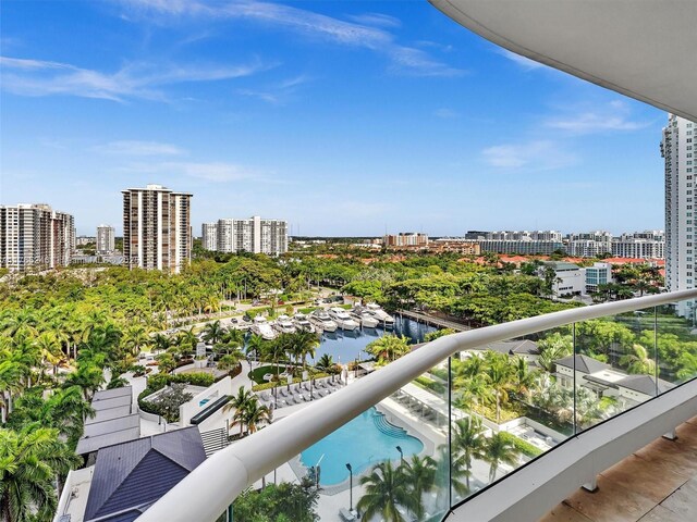 7000 Island Blvd Unit 1208, Aventura, FL 33160 - balcony with a view of city, a water view, view of pool, and view of marina