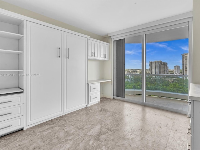 7000 Island Blvd Unit 1208, Aventura, FL 33160 - unfurnished bedroom featuring a view of city and an office area