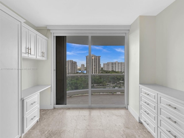 7000 Island Blvd Unit 1208, Aventura, FL 33160 - unfurnished bedroom featuring a view of city and light tile patterned flooring