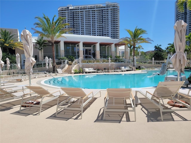 7000 Island Blvd Unit 1208, Aventura, FL 33160 - community pool featuring a patio