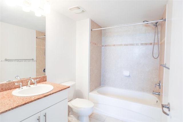 full bathroom featuring tile patterned flooring, vanity,  shower combination, and toilet