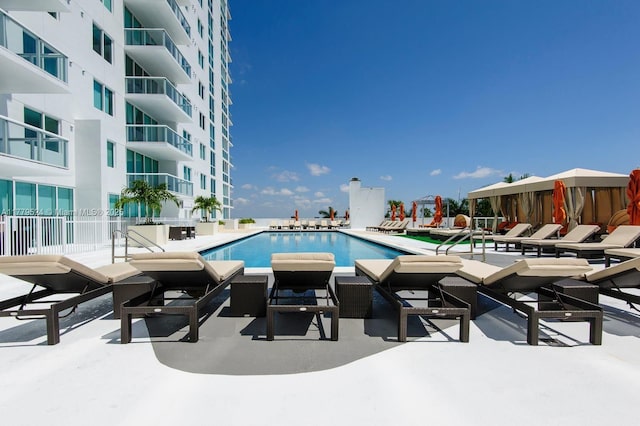pool with a patio area