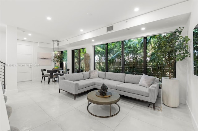 2679 NE 8th Ave, Wilton Manors, FL 33334 - living area with recessed lighting and light tile patterned flooring