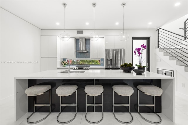 2679 NE 8th Ave, Wilton Manors, FL 33334 - stairs featuring wood finished floors and recessed lighting