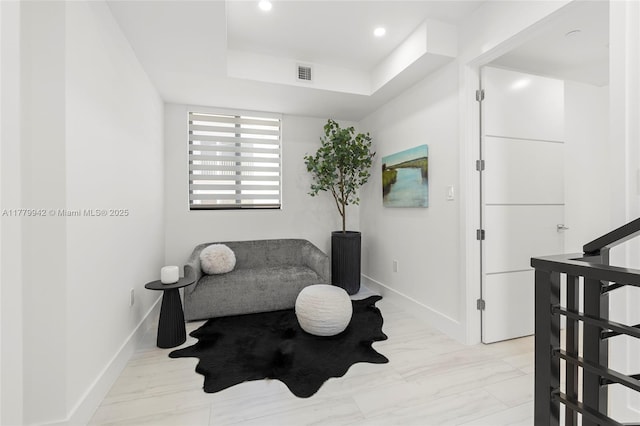 2679 NE 8th Ave, Wilton Manors, FL 33334 - kitchen with stacked washer and clothes dryer, a sink, white cabinetry, baseboards, and modern cabinets