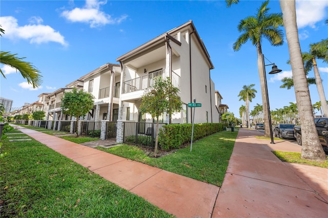 4641 NW 83rd Pkwy Unit 4641, Doral, FL 33166 - view of building exterior featuring fence and a residential view