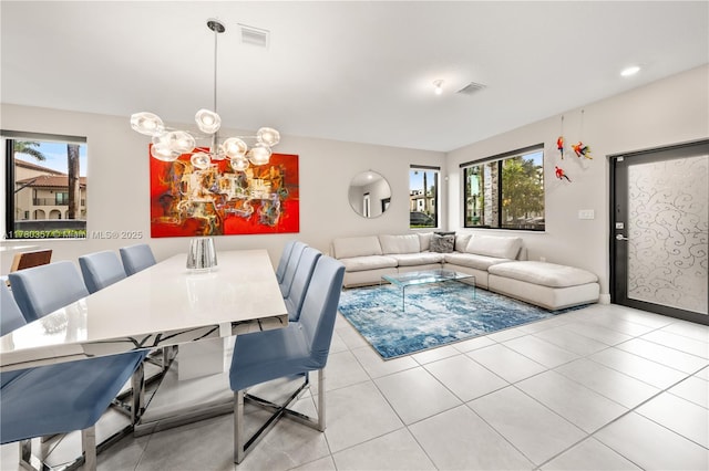 4641 NW 83rd Pkwy Unit 4641, Doral, FL 33166 - dining area with baseboards, light tile patterned floors, a notable chandelier, and visible vents