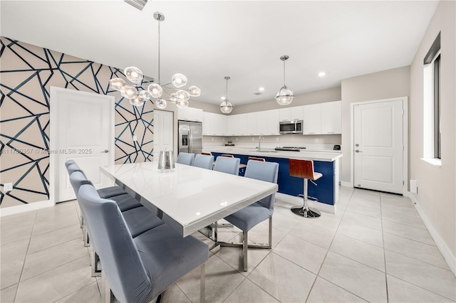 4641 NW 83rd Pkwy Unit 4641, Doral, FL 33166 - dining room with light tile patterned floors, baseboards, recessed lighting, and wallpapered walls