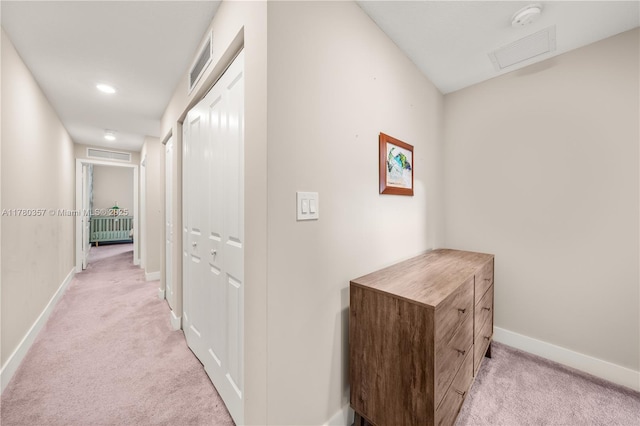 4641 NW 83rd Pkwy Unit 4641, Doral, FL 33166 - hallway featuring light carpet, baseboards, and visible vents