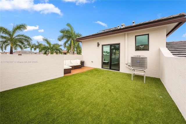 4641 NW 83rd Pkwy Unit 4641, Doral, FL 33166 - rear view of house with a lawn, an outdoor living space, fence, a patio, and stucco siding